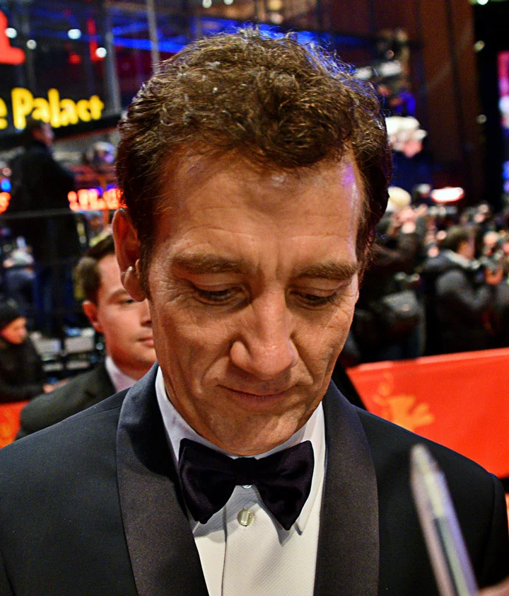 Clive Owen in a black dinner jacket and bow tie at the Berlin film festival.